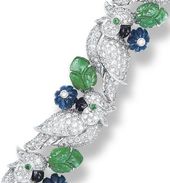 Detail: Cartier diamond, emerald, and sapphire bird bracelet. Via Diamonds in th...