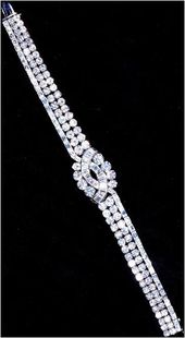The Baguette and Brilliant Bracelet. Diamonds set in platinum from her father, K...