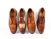 Expertly crafted from burnished calfskin leather and finished with subtle perfor...
