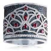 A Fabergé bangle set in 18K white gold and features 2,172 alexandrites, rubies ...