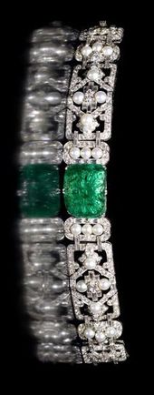 An Art Deco emerald, pearl diamond bracelet, ca 1935. The central oblong emerald...