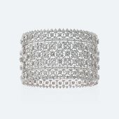 The openwork, light as a lace and brilliant as a roomful of mirrors, features sq...