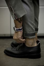 Suit, Wingtips and Tattoos
