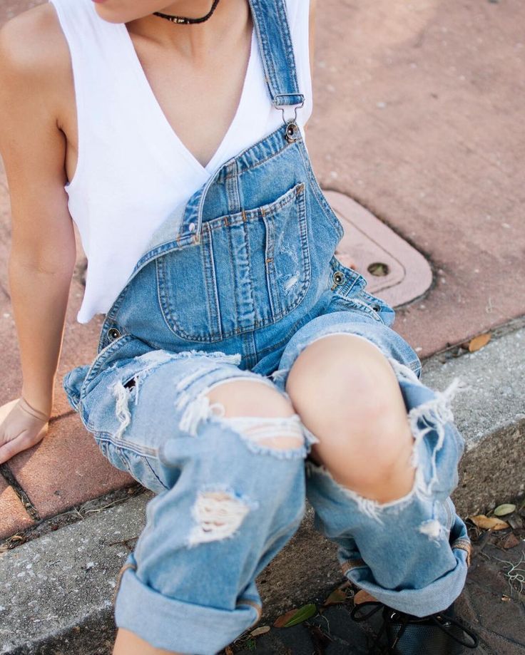 Distressed overalls and simple sleeveless v-neck-- We